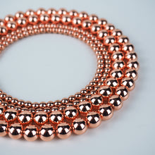 Load image into Gallery viewer, Titanium-Plated Hematite (Rose Gold)